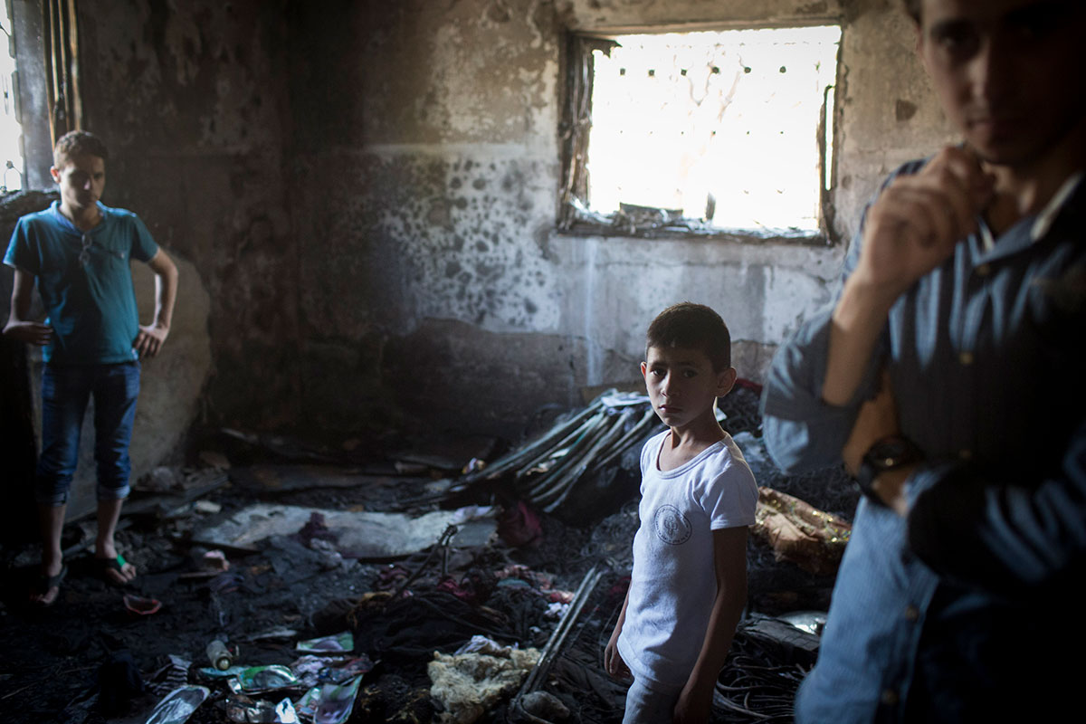  Zerstörtes Haus der Dawabsha Familie. Bei dem Brandanschlag starb ein 18 Monate altes Baby und mehrere Menschen wurden verletzt. Duma, Westbank, 2015. Foto: Activestills