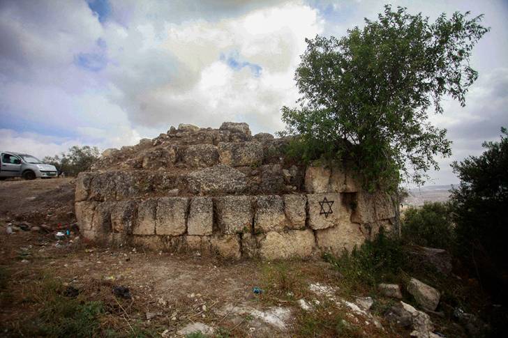 View of a graffiti spray-painted by extremist Jews, in the ancient archeological site of Sebastia, near the West Bank city of Nablus, May 12, 2025. Photo by Nasser Ishtayeh/Flash90